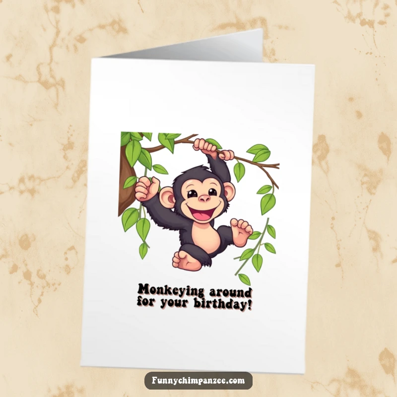 Funny Free Printable Birthday Card: Kawaii chimpanzee swinging joyfully from a leafy vine with a huge, infectious grin.