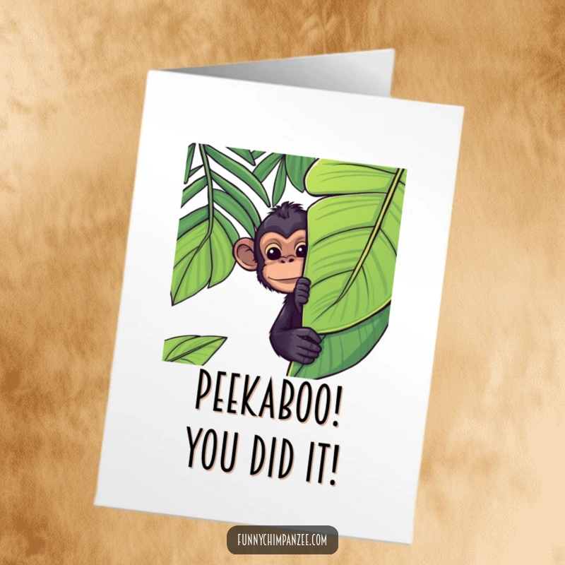 Funny Free Printable Congrats Card: A kawaii chimpanzee peeks out playfully from behind a big, lush jungle leaf.