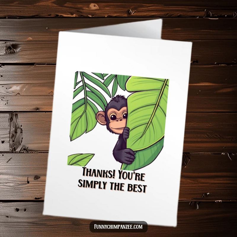 Funny Free Printable Thank You Card: A shy but happy kawaii chimpanzee peeking from behind a huge, green jungle leaf.